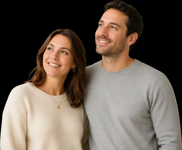 Happy couple admiring their new shutters
